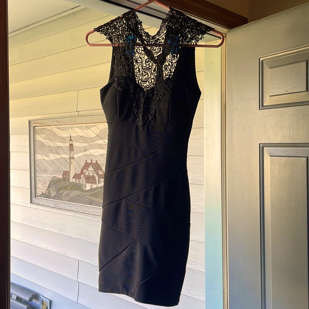 Black bodcon. Elegant and embellished. Padded. XS. Brand honey and Rosie.